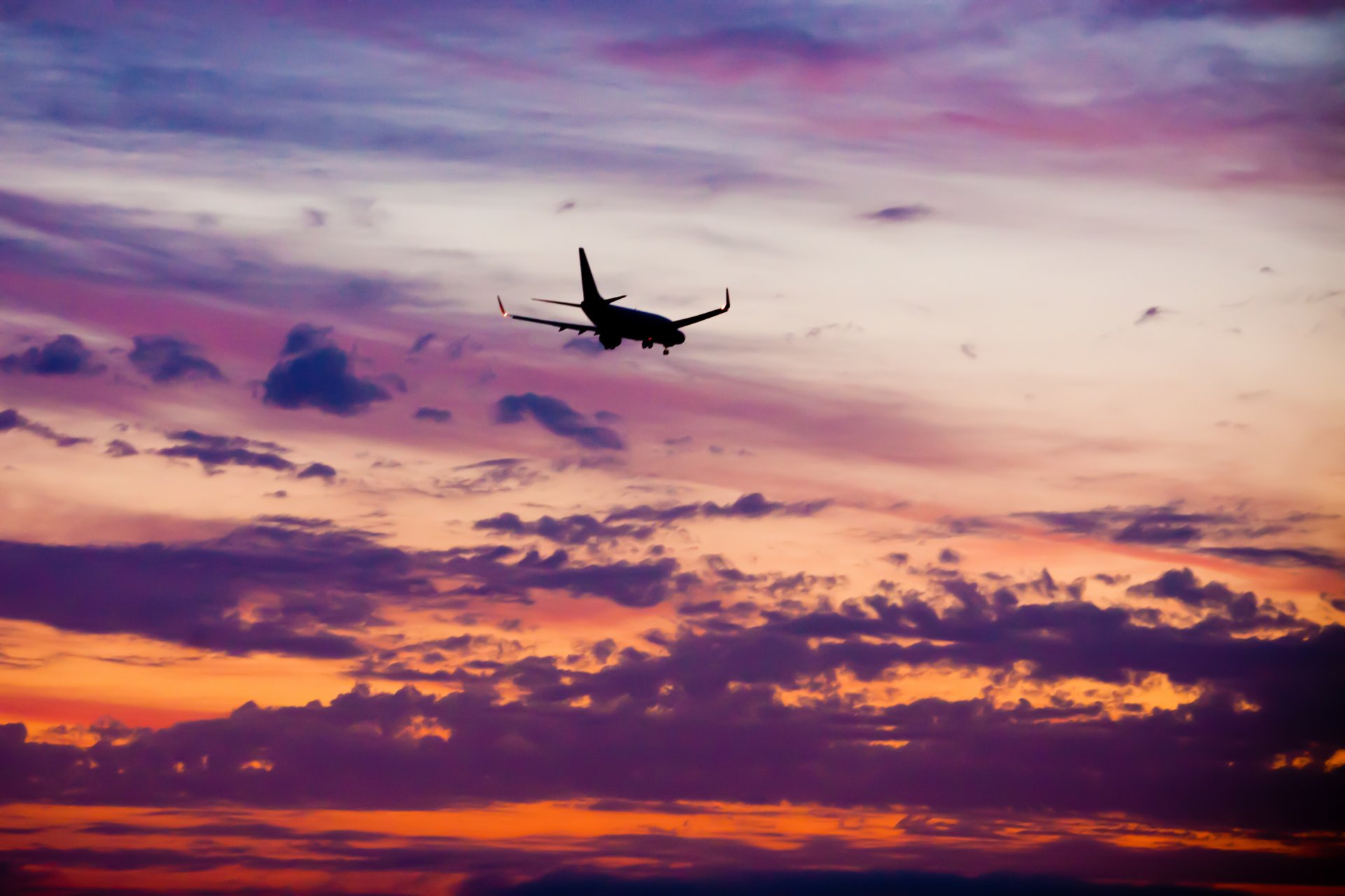 plane passenger flight height night sunset sky cloud