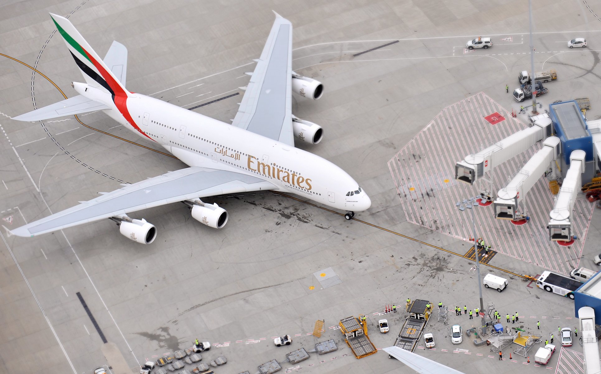 airbus a380 emirates airline plane passenger airliner airport people top view on the ground