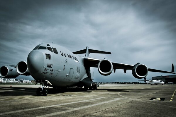 An American plane on an airfield field