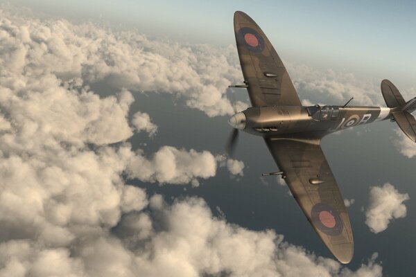 Military aircraft in the sky above the clouds