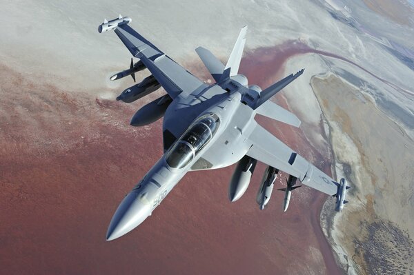 US military aircraft Boeing on the background of the earth s surface