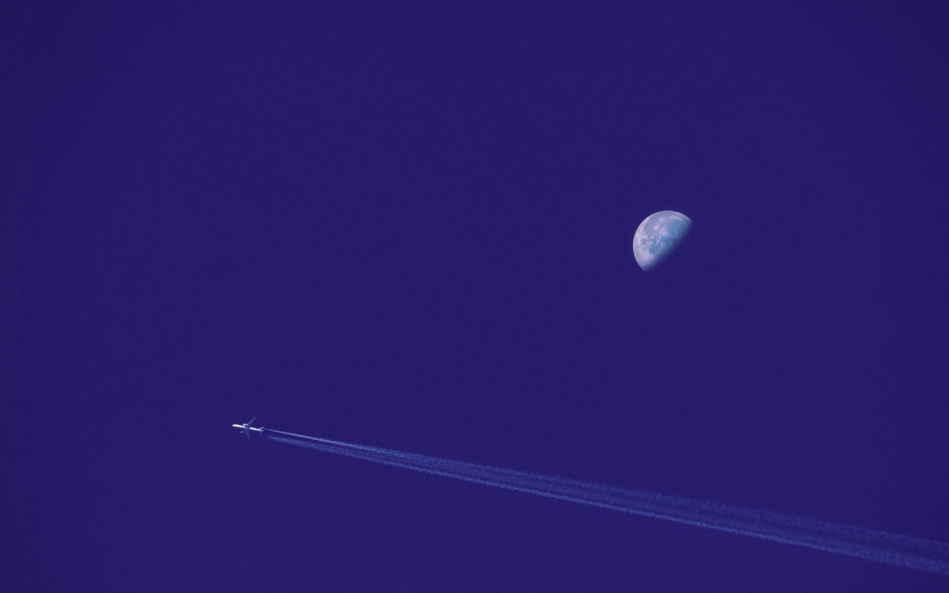 plane moon sky