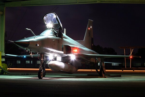 Fighter with lanterns in the dark