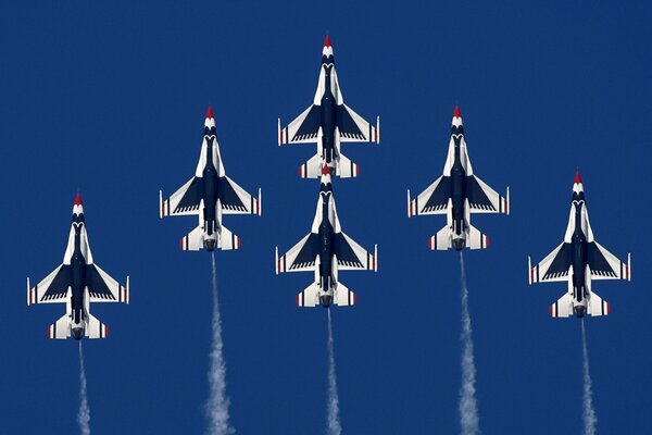 Six fighters on a blue background