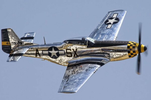 The r-51 Mustang flying in the sky