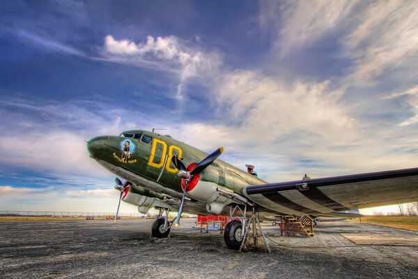 Picture of a douglas c-47 skytrain aircraft standing