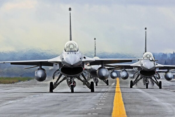 Photos of the airfield with planes ready to take off to the top