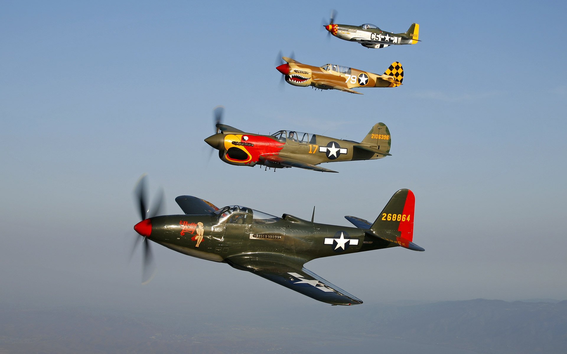 bell p-63a kingcobra “pretty polly” warhawk curtiss p-40n warhawk “parrothead” curtiss p-40n warhawk p-51d mustang lady alice