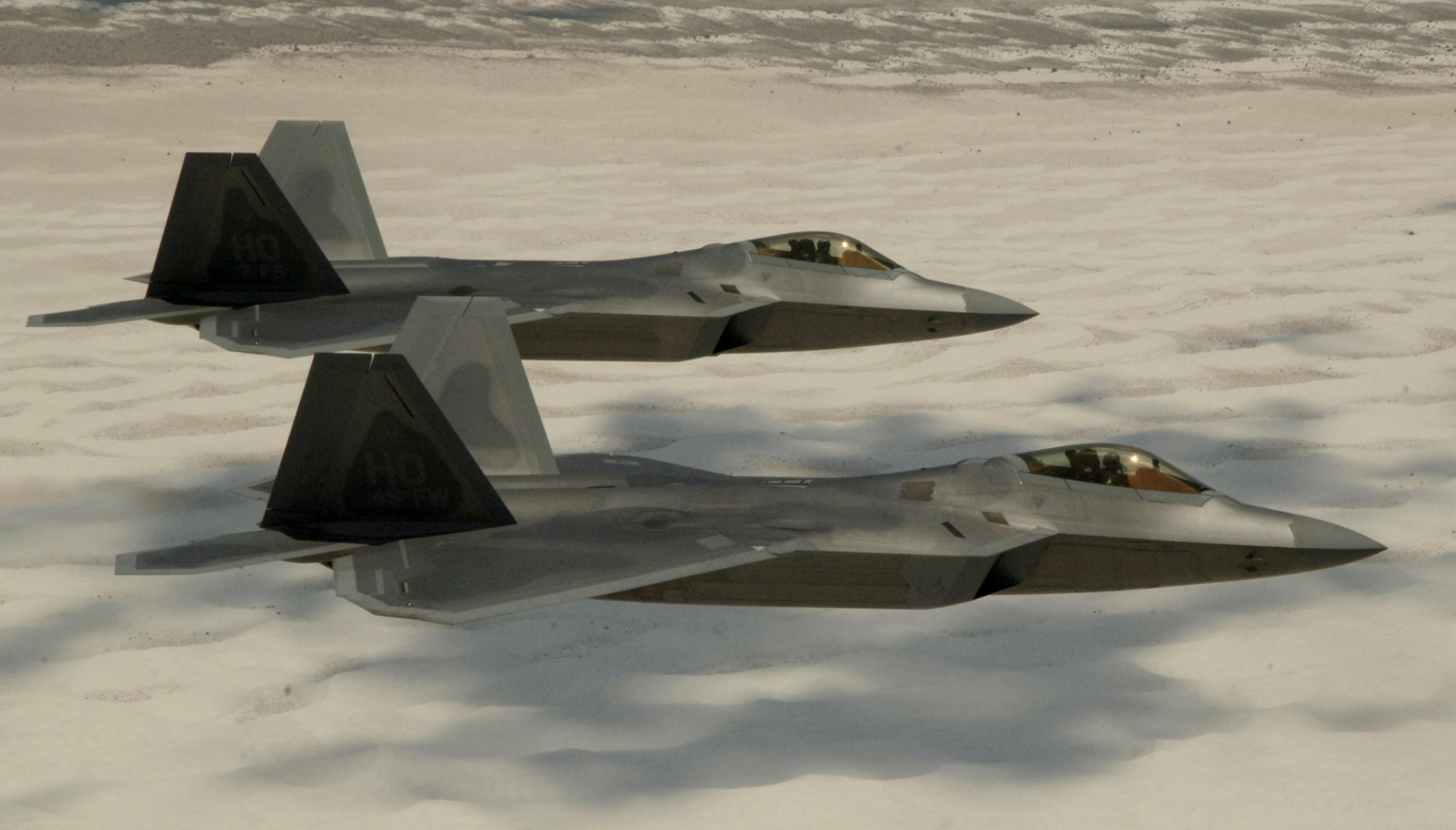 foto lockheed / boeing f-22 raptor raptor multiusos luchador vuelo altitud desierto arena