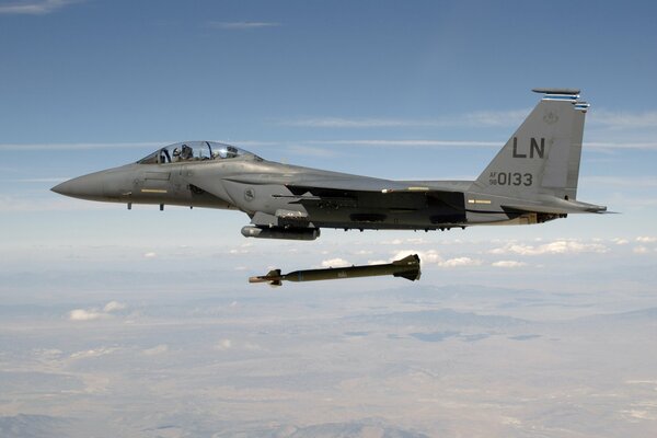 Gray A-15 plane drops a bomb