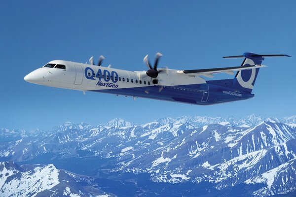 Passenger jet, flying over the mountains