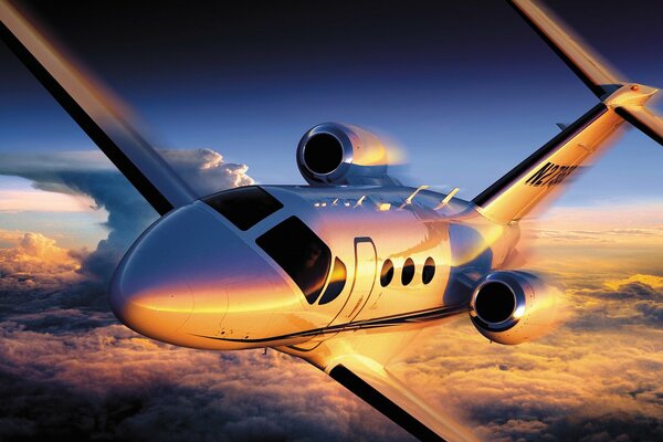 Cessna citation 4 aircraft flying high above the clouds