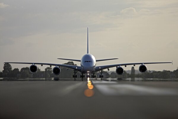 At the airport, a plane takes off into the sky