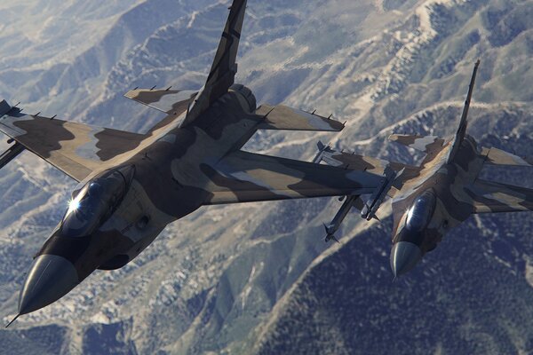 Two combat aircraft in the sky, camouflage