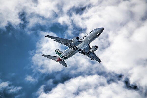 The plane is flying in the sky to Aeroflot