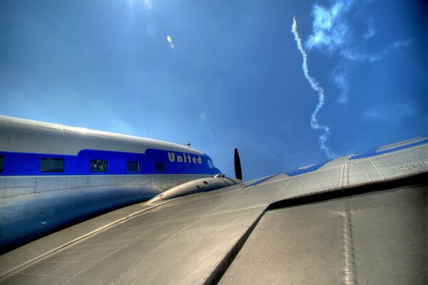 Photo from an airplane wing in the sky