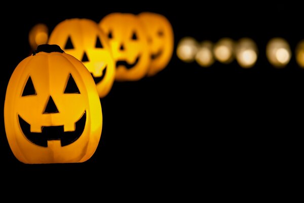 Halloween pumpkins on a black background