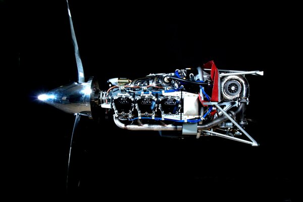 Turbine engine of an airplane on a black background