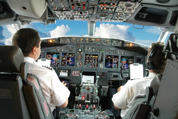 The cockpit of the aircraft pilots in the blue sky