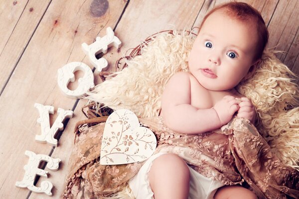 Happy baby with blue eyes