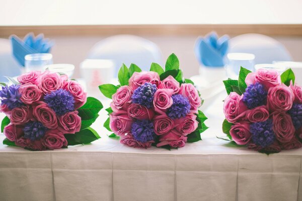 Three wedding bouquets on the table