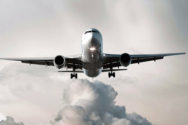 The take-off of the Boeing-737 into the clouds