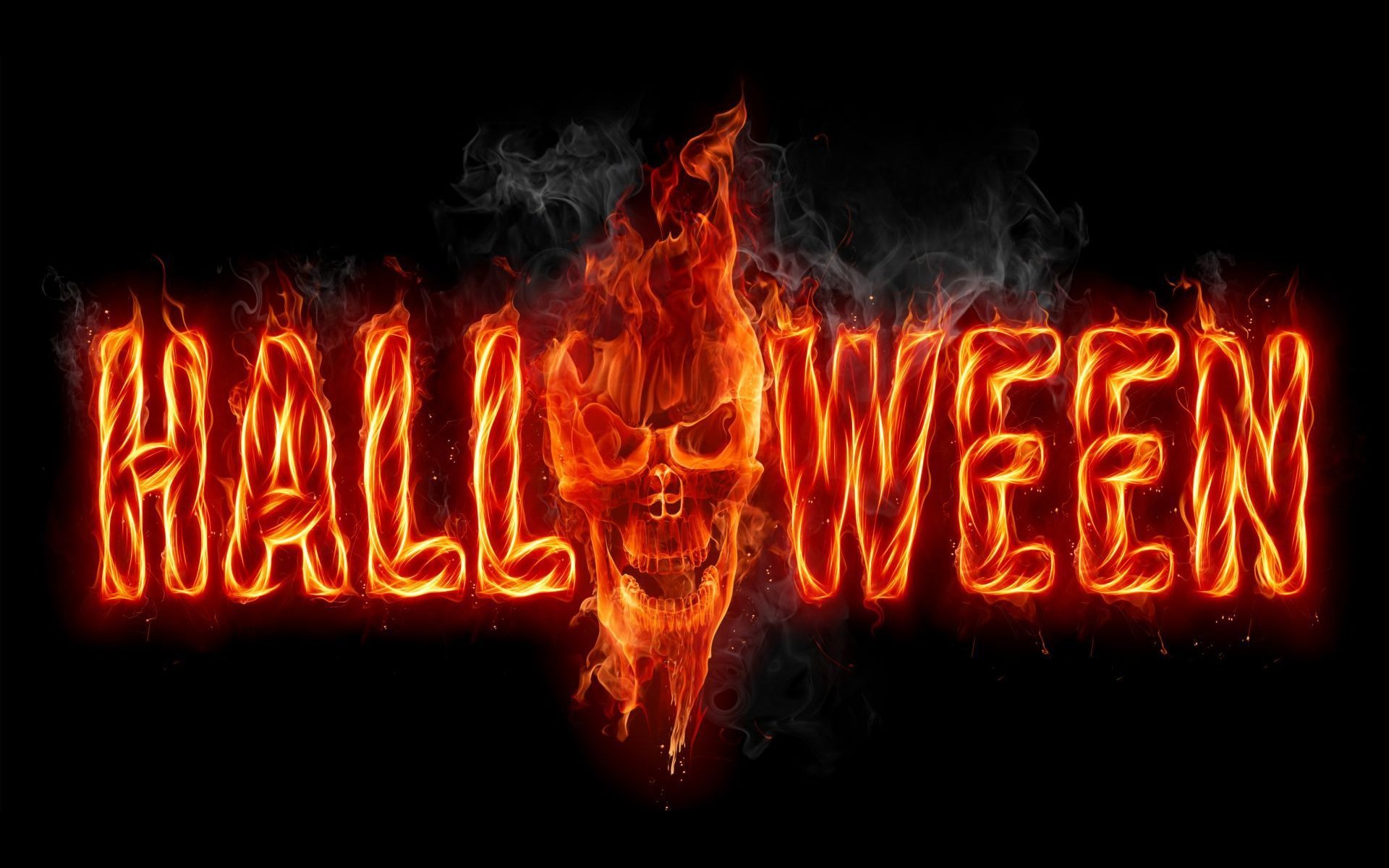 halloween schwarzer hintergrund feuer schädel inschrift