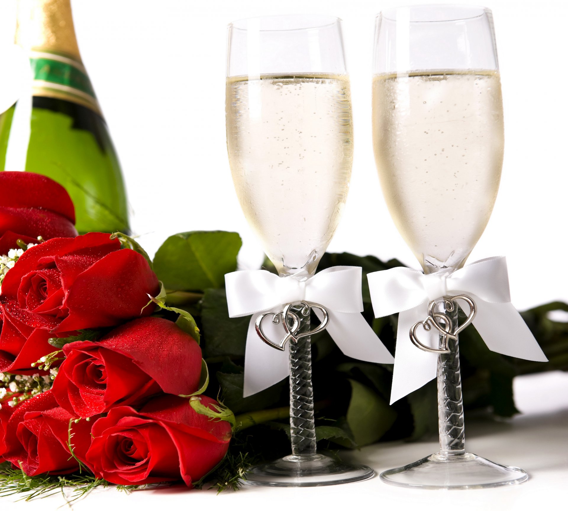 vacanza san valentino rose champagne rosso bicchieri fiocco fiori cibo foto