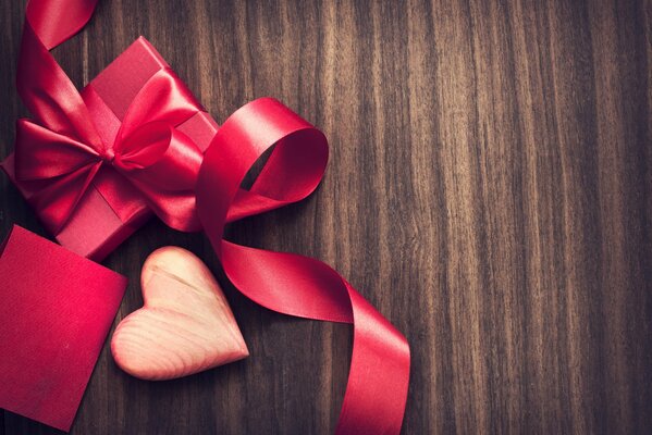 Romantic gift with ribbons and a heart