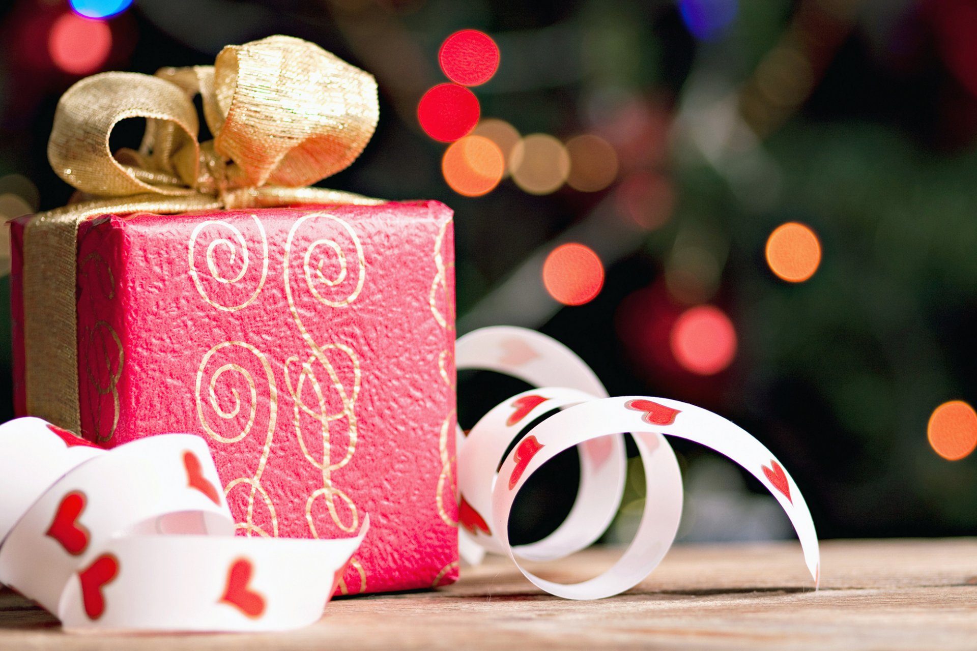 vacaciones regalo caja regalo rojo arco oro cinta bokeh