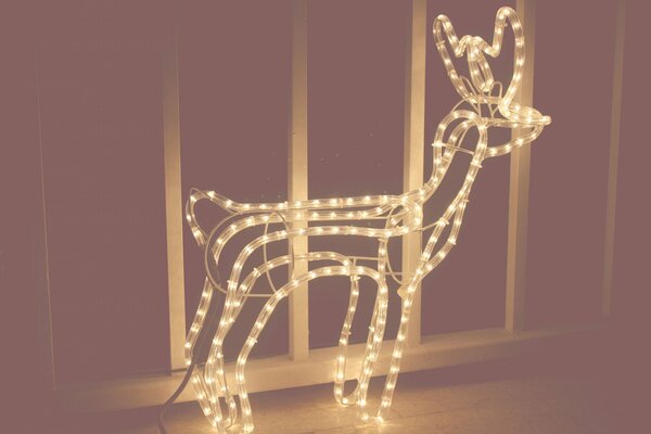 Figurine di cervi di Natale dalle lampadine