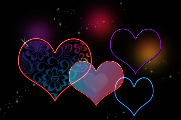 Varios corazones sobre un fondo oscuro