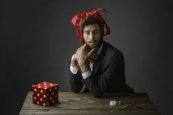 A man instead of a gift with a bow
