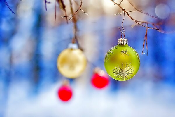 Christmas toys on the background of a winter forest