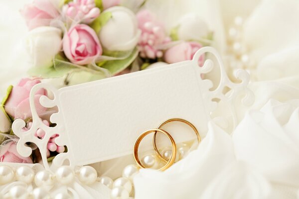 Anillos de boda con fondo de encaje Postal