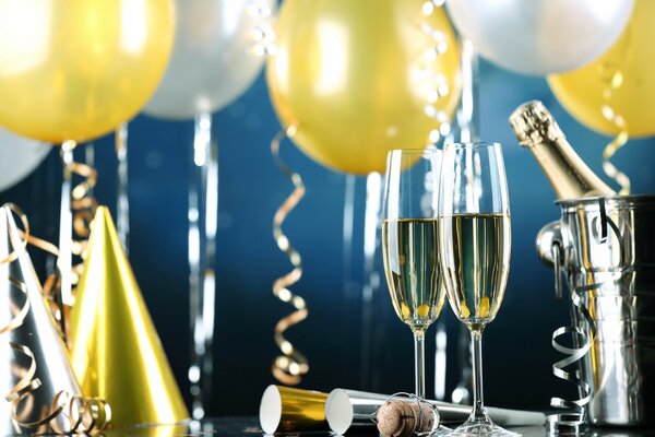 New Year s champagne with golden balls
