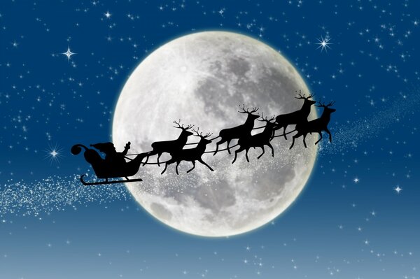 Père Noël sur fond de grande lune