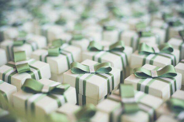 Gifts tied with a green satin ribbon