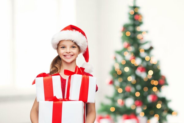 A child holds gifts for the new year