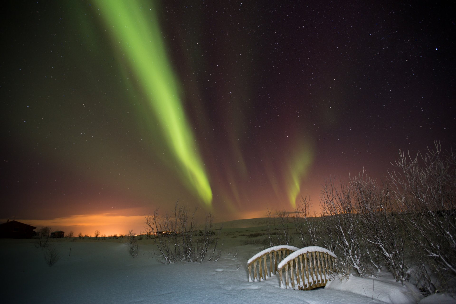 aurora borealis northern lights night winter bridge star