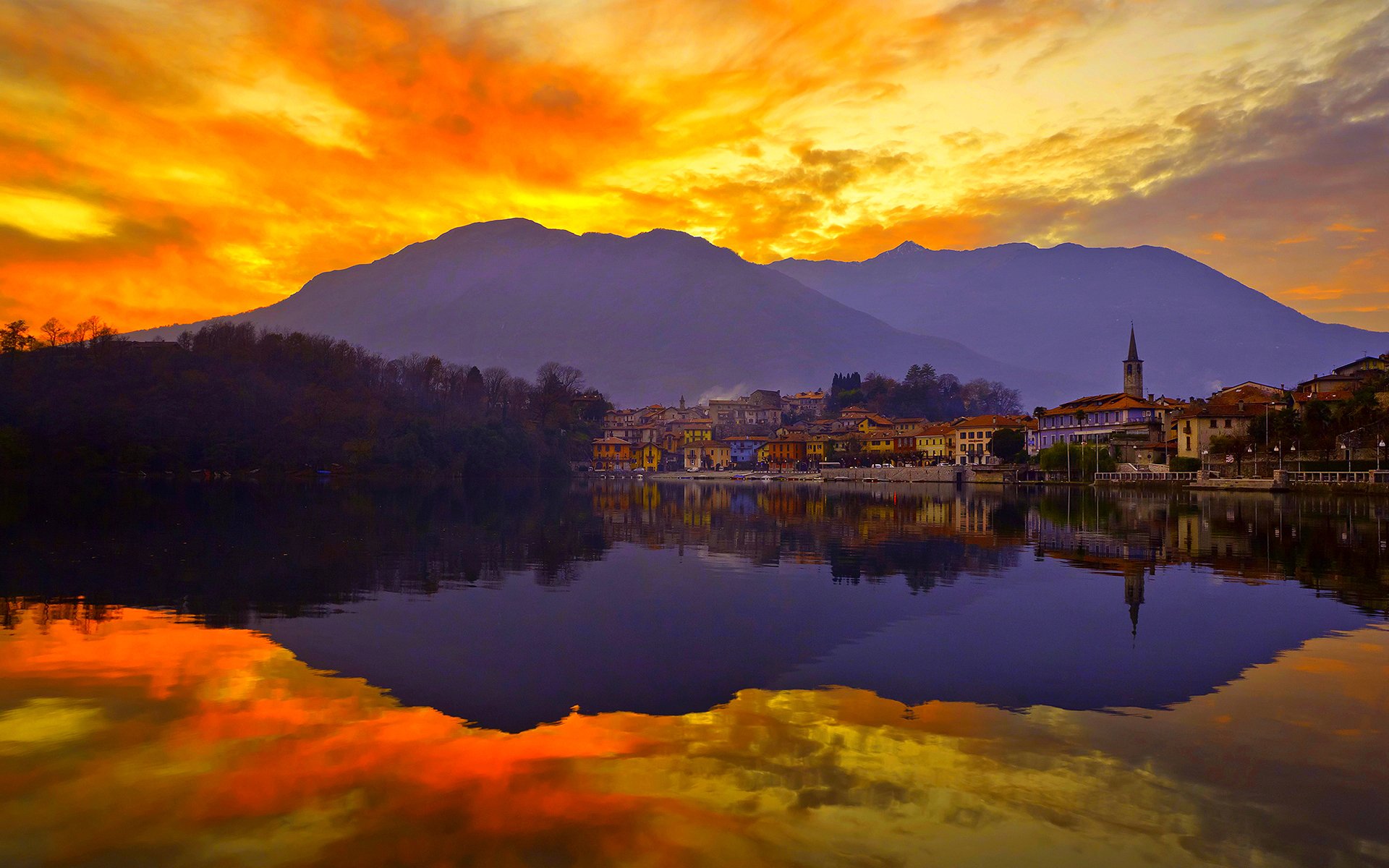 cielo puesta de sol montañas lago ciudad reflexión