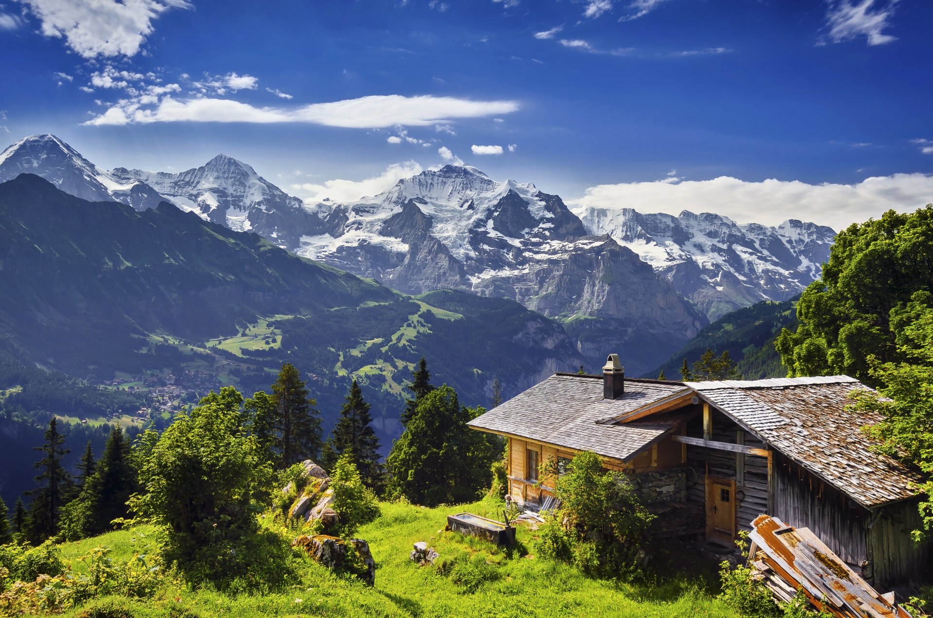 suiza grindelwald montañas rocas glaciar garganta cabaña hierba piedras árboles panorama