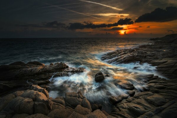 Waves hitting the rocky shore