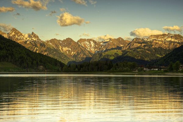 Mountain landscape with lake in the evening