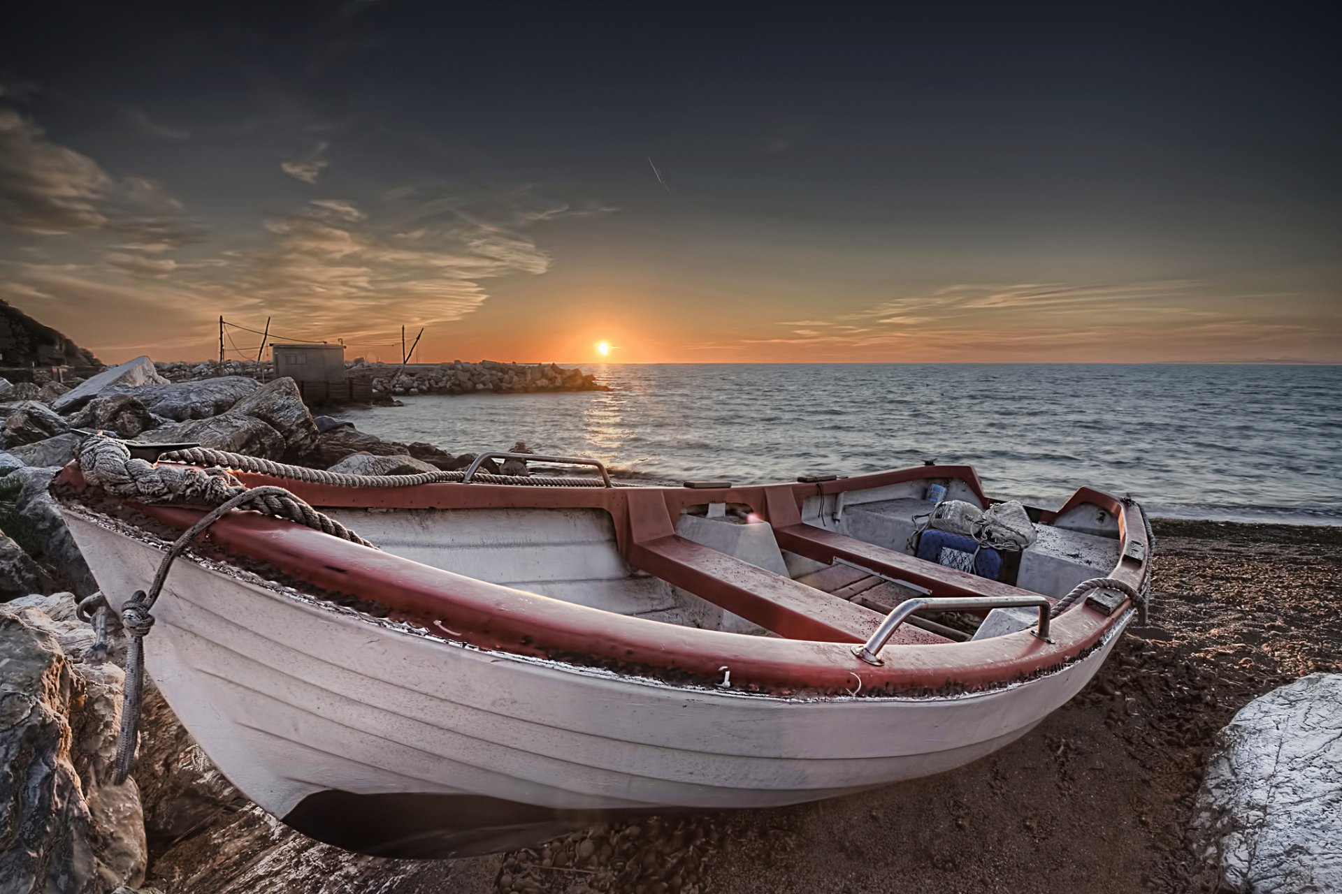 mare riva barca tramonto