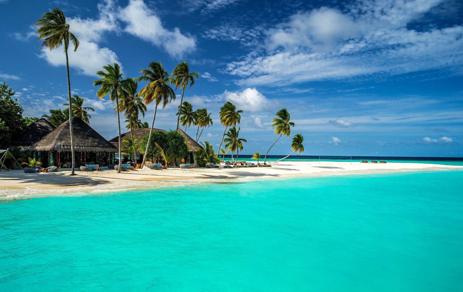 the maldives tropics sea bungalow coast palm sand sky clouds horizon