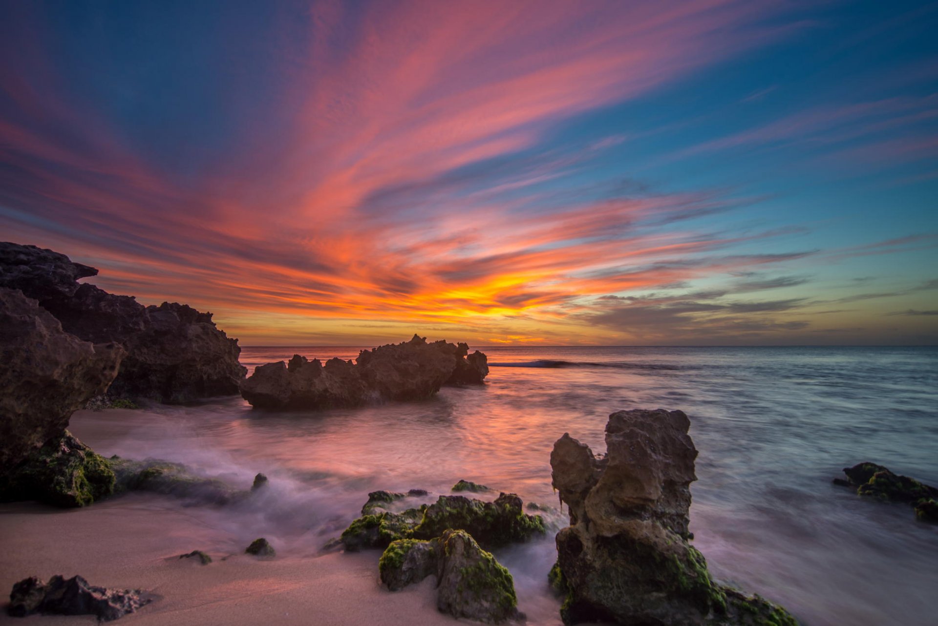 océano rocas puesta de sol paisaje