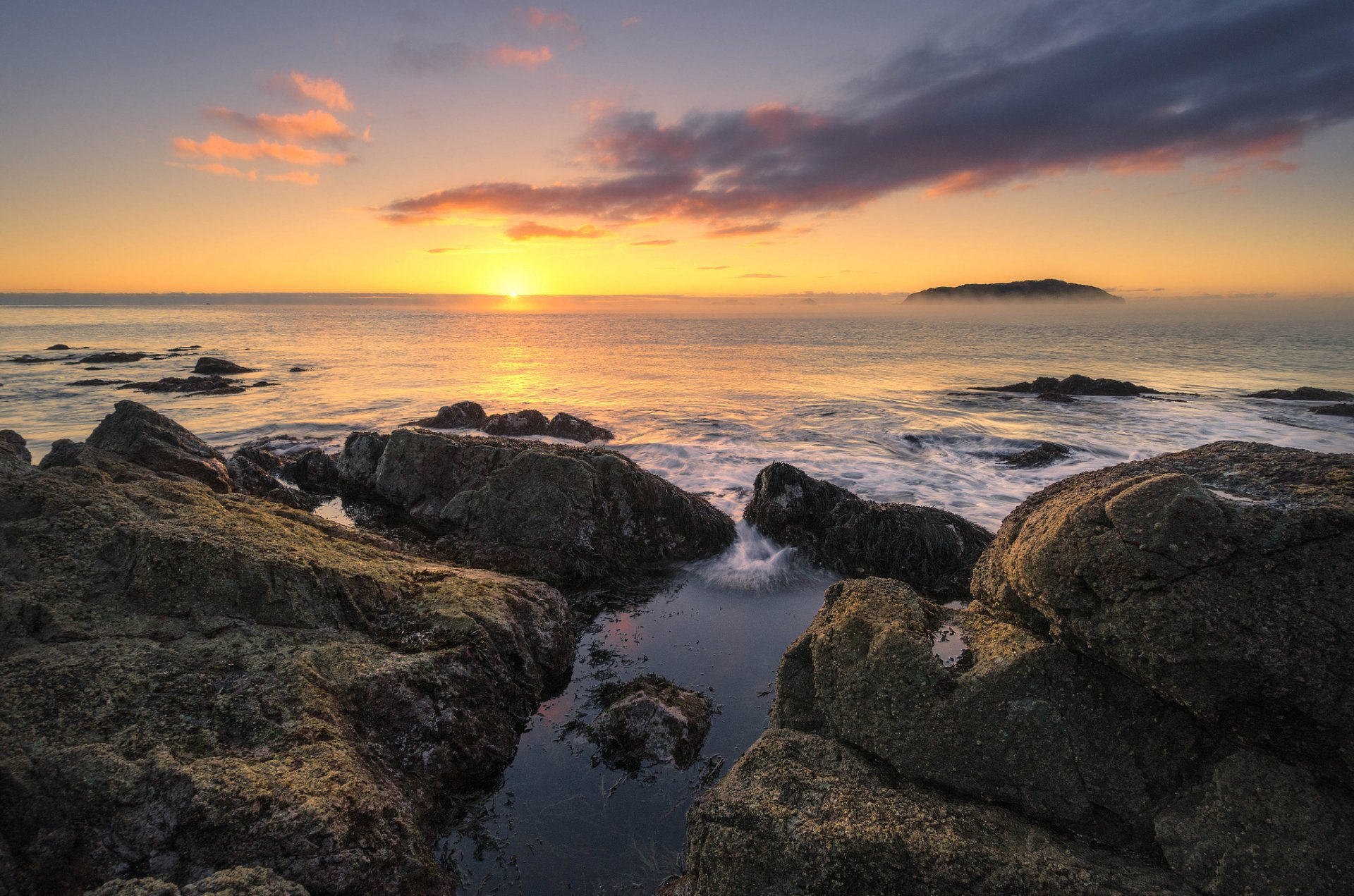 tairua waikato nz nuova zelanda oceano mattina alba orizzonte sole pietre