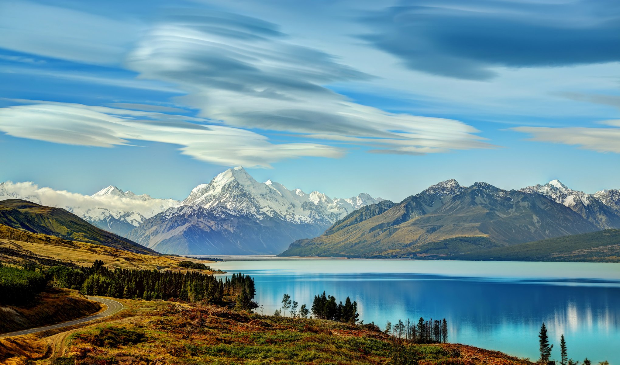 new zealand forest road mountain rock ice lake lake wakatipu sky clouds beautiful