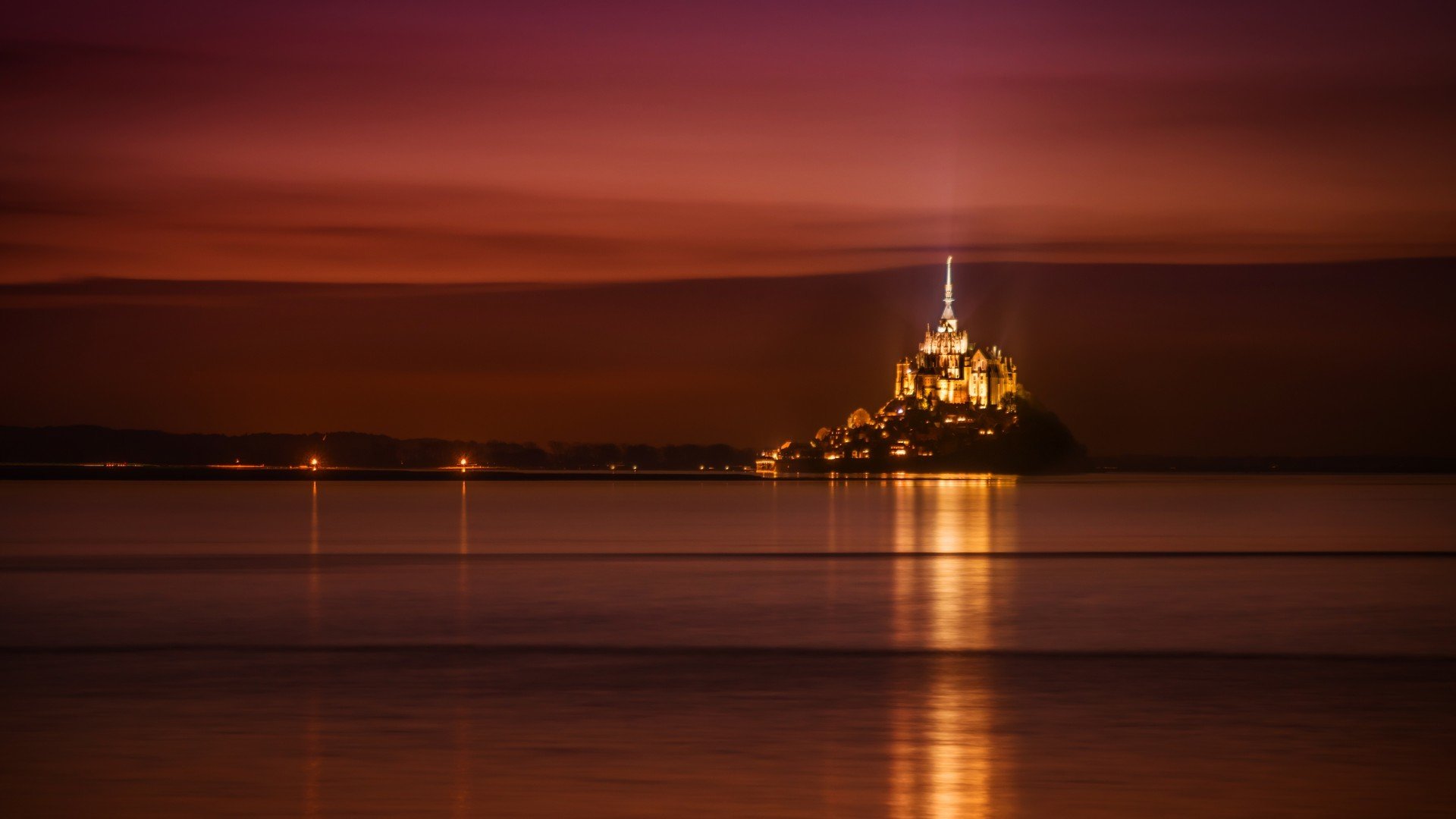 francja normandia zamek mont saint-michel niebo noc morze światła